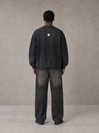 Model wearing the SM Sig. Shadow Fade Bomber Jacket in Midnight Black, rear view.