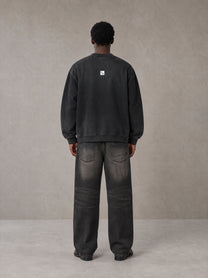 Model wearing the SM Sig. Shadow Fade Bomber Jacket in Midnight Black, rear view.