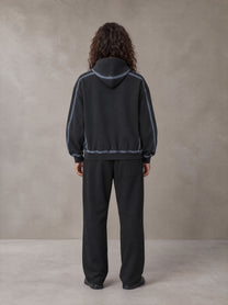 Model wearing the SM Sig. Straight Leg Sweatpants in Midnight Black, rear view.