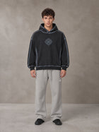 Model wearing the SM Sig. Straight Leg Sweatpants in Pure Grey, front view.