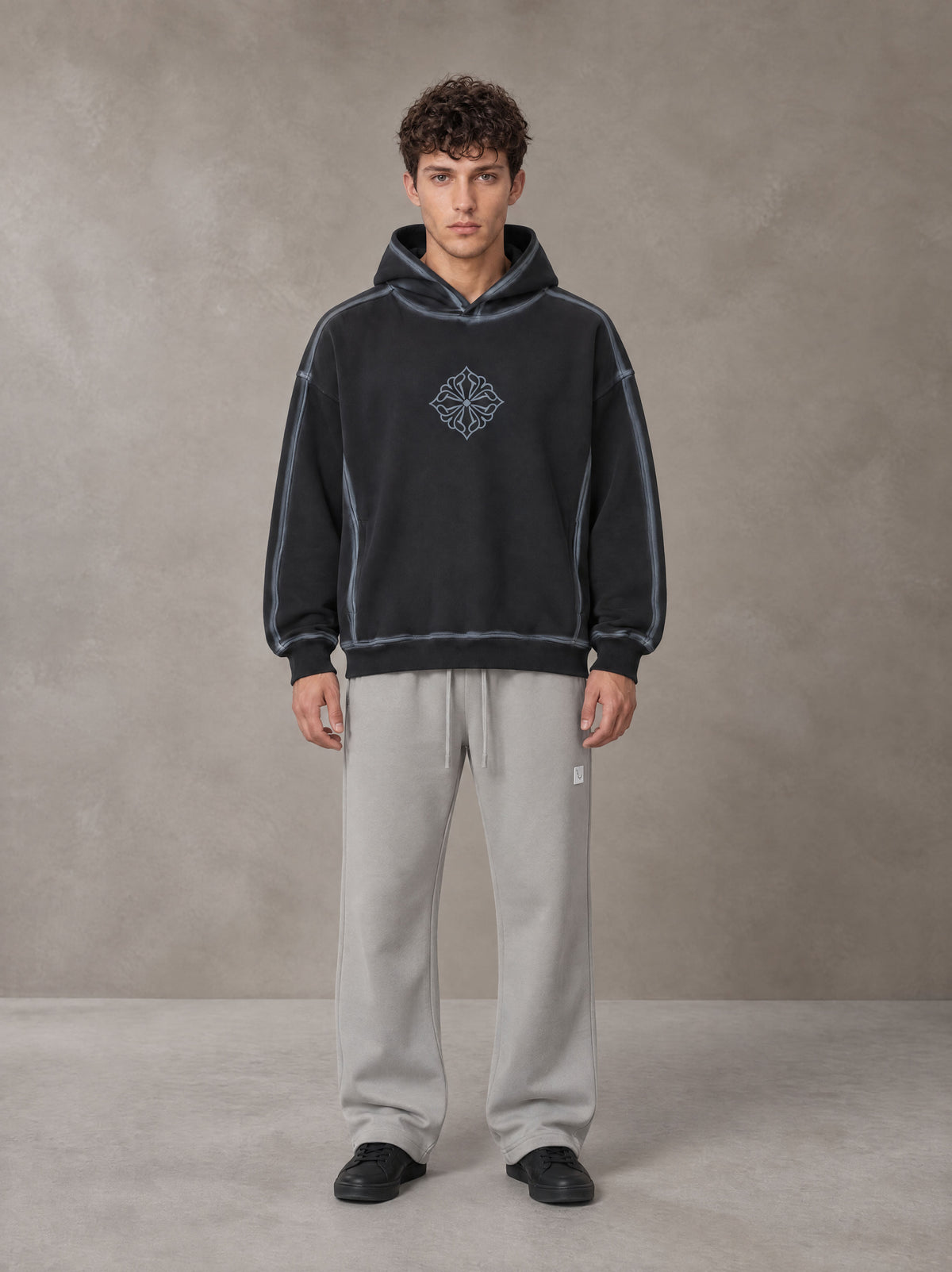 Model wearing the SM Sig. Straight Leg Sweatpants in Pure Grey, front view.
