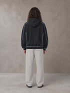 Model wearing the SM Sig. Straight Leg Sweatpants in Pure Grey, rear view.