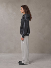 Model wearing the SM Sig. Straight Leg Sweatpants in Pure Grey, side profile.