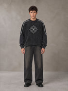 Model wearing the SM Fleur Eclipse Sweatshirt in Midnight Black, front view.