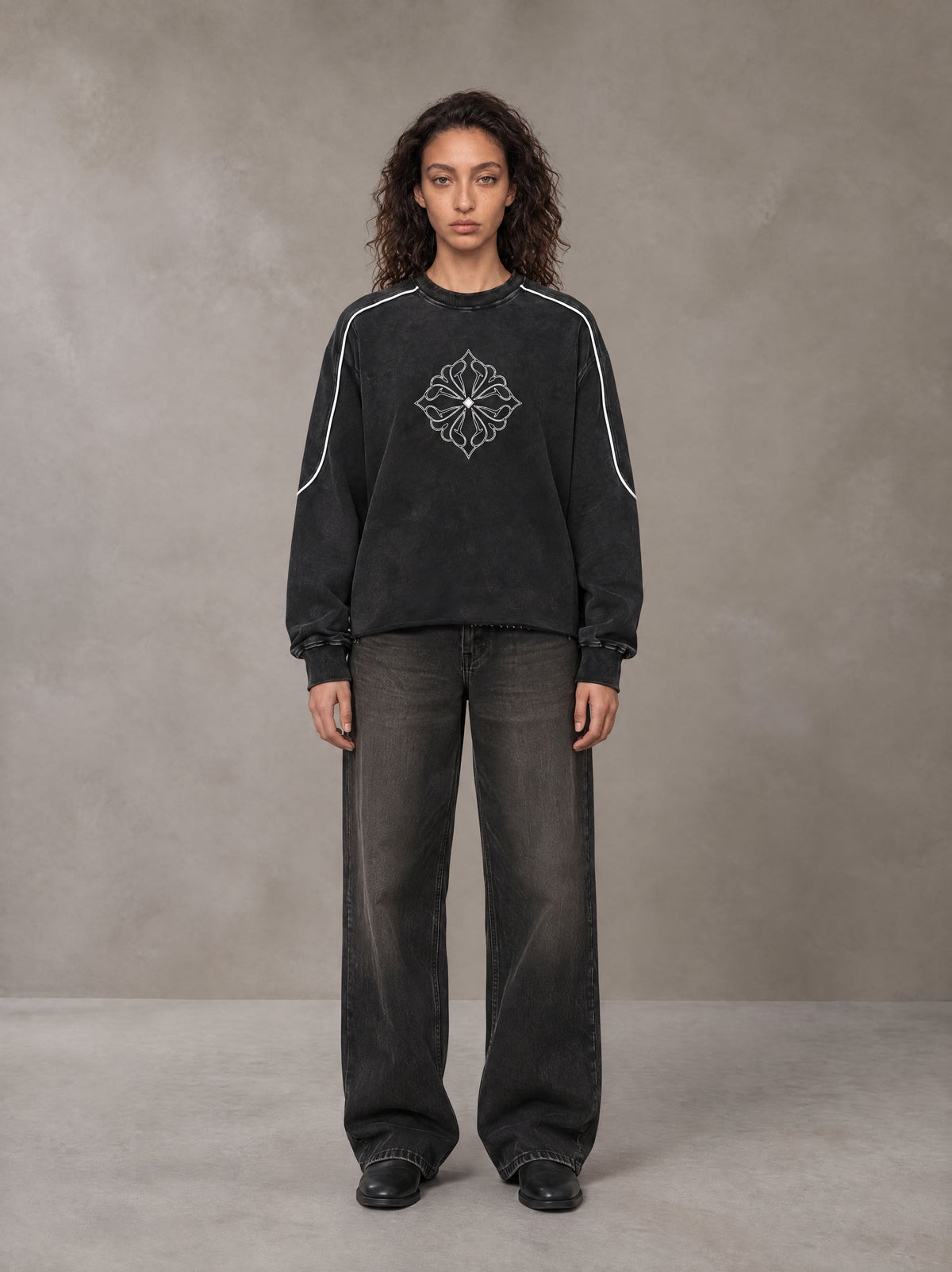 Model wearing the SM Fleur Eclipse Sweatshirt in Midnight Black, front view.