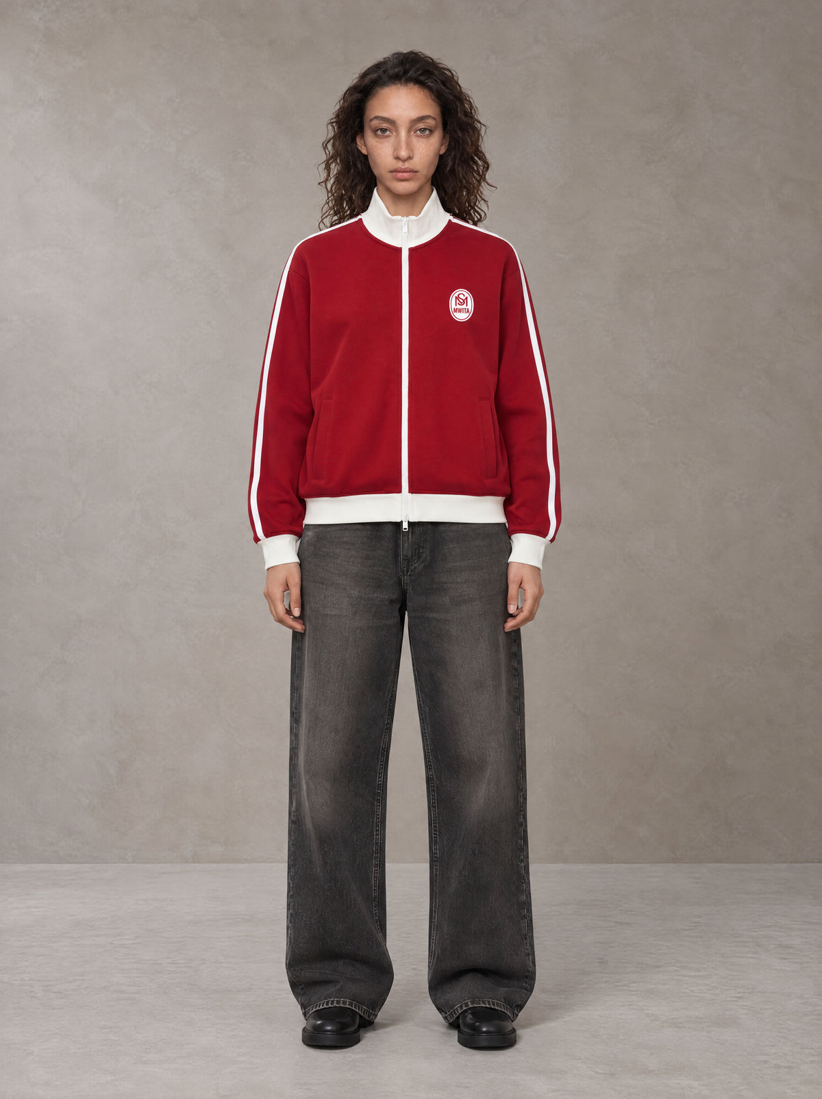 Model wearing the SM Insignia Contrast Trim Jacket in Deep Carmine, front view.