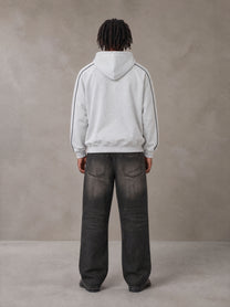 Model wearing the SM Insignia Parallel Hoodie in Floral Grey, rear view.
