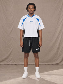 Model wearing the SM Motion Vector Jersey in Lucent White, front view.