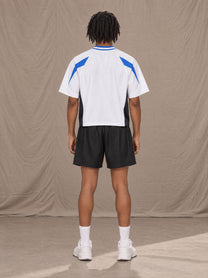 Model wearing the SM Motion Vector Jersey in Lucent White, rear view.