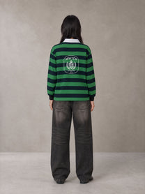 Model wearing the SM Royal Emblem Rugby Polo T-shirt in Dark Spring Green, rear view.