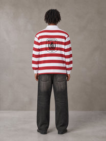 Model wearing the SM Royal Emblem Rugby Polo T-shirt in Deep Carmine, rear view.