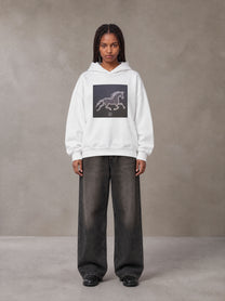 Model wearing the SM Celestial Charge Hoodie in Lucent White, front view.
