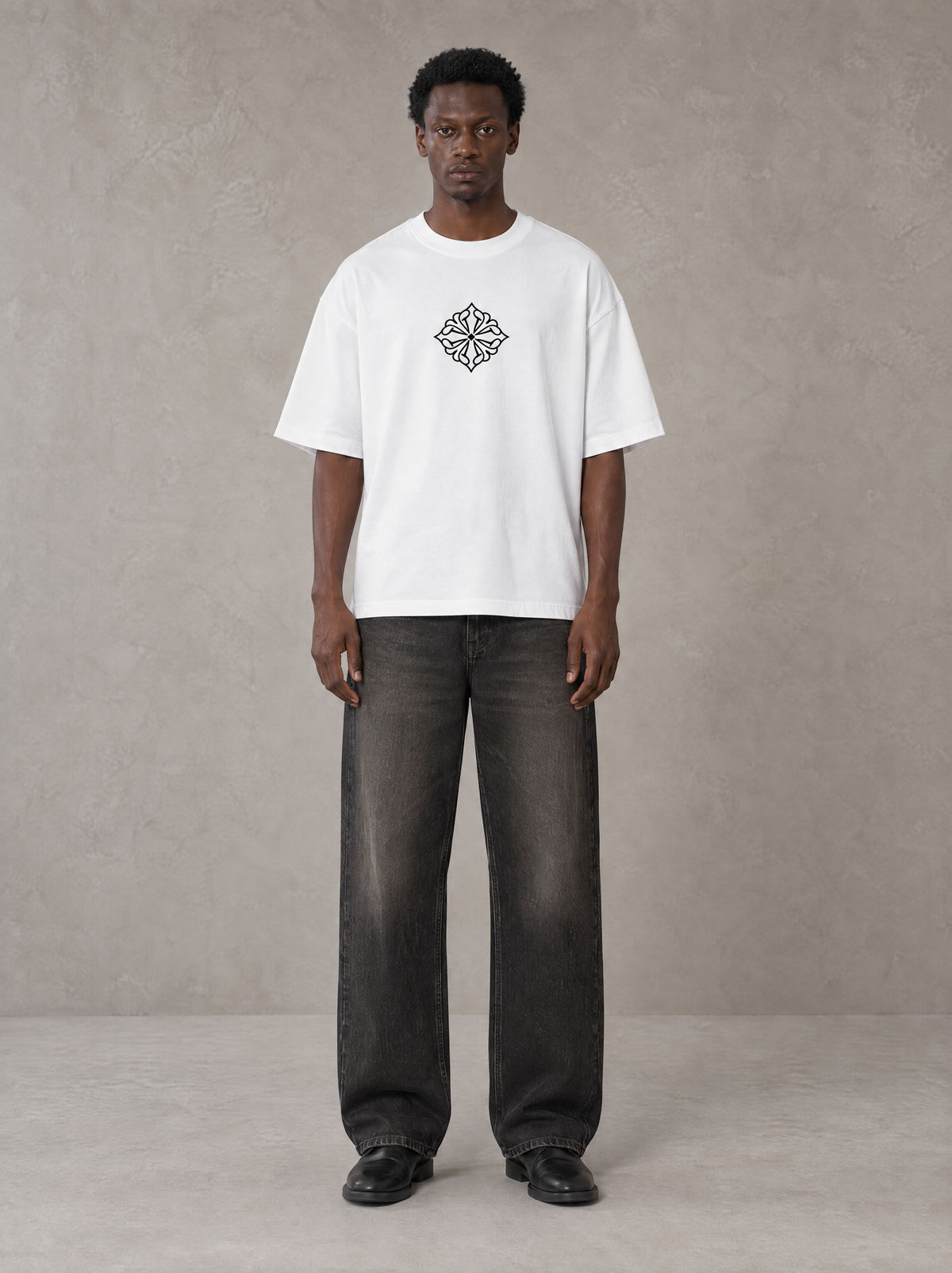 Model wearing the SM Fleur T-shirt in Lucent White, front view.