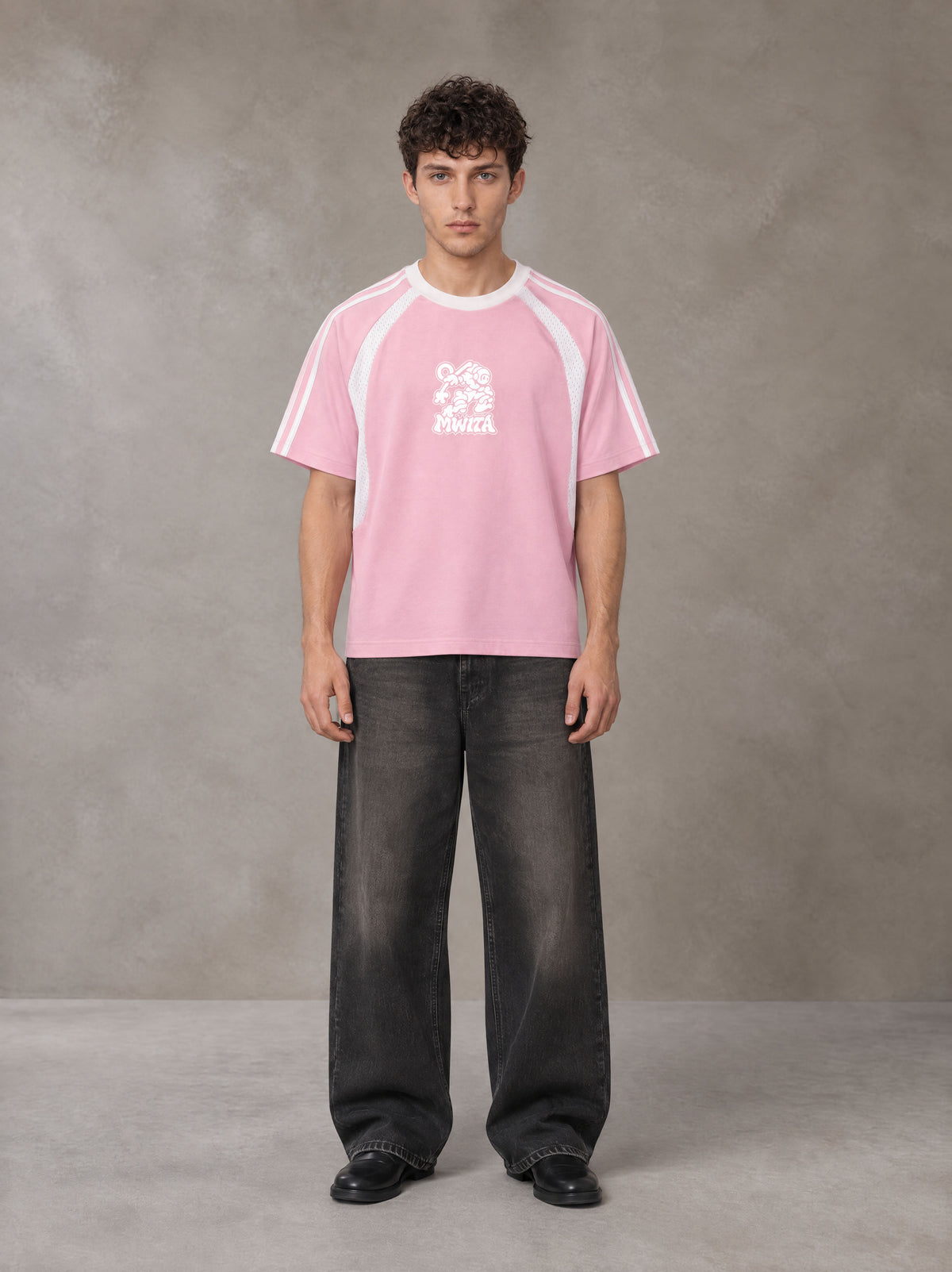 Model wearing the SM Cosmic Bloom T-shirt in Blossom, front view.