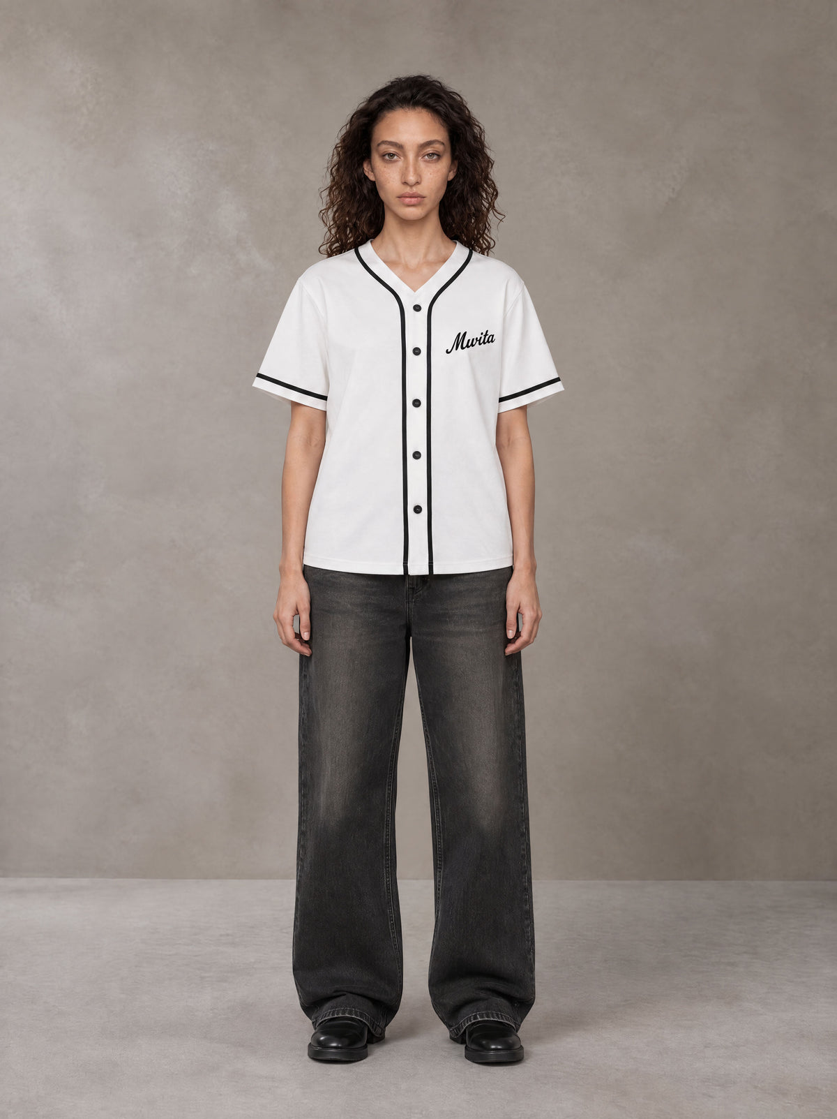 Model wearing the SM Dugout Atelier T-shirt in Lucent White, front view.
