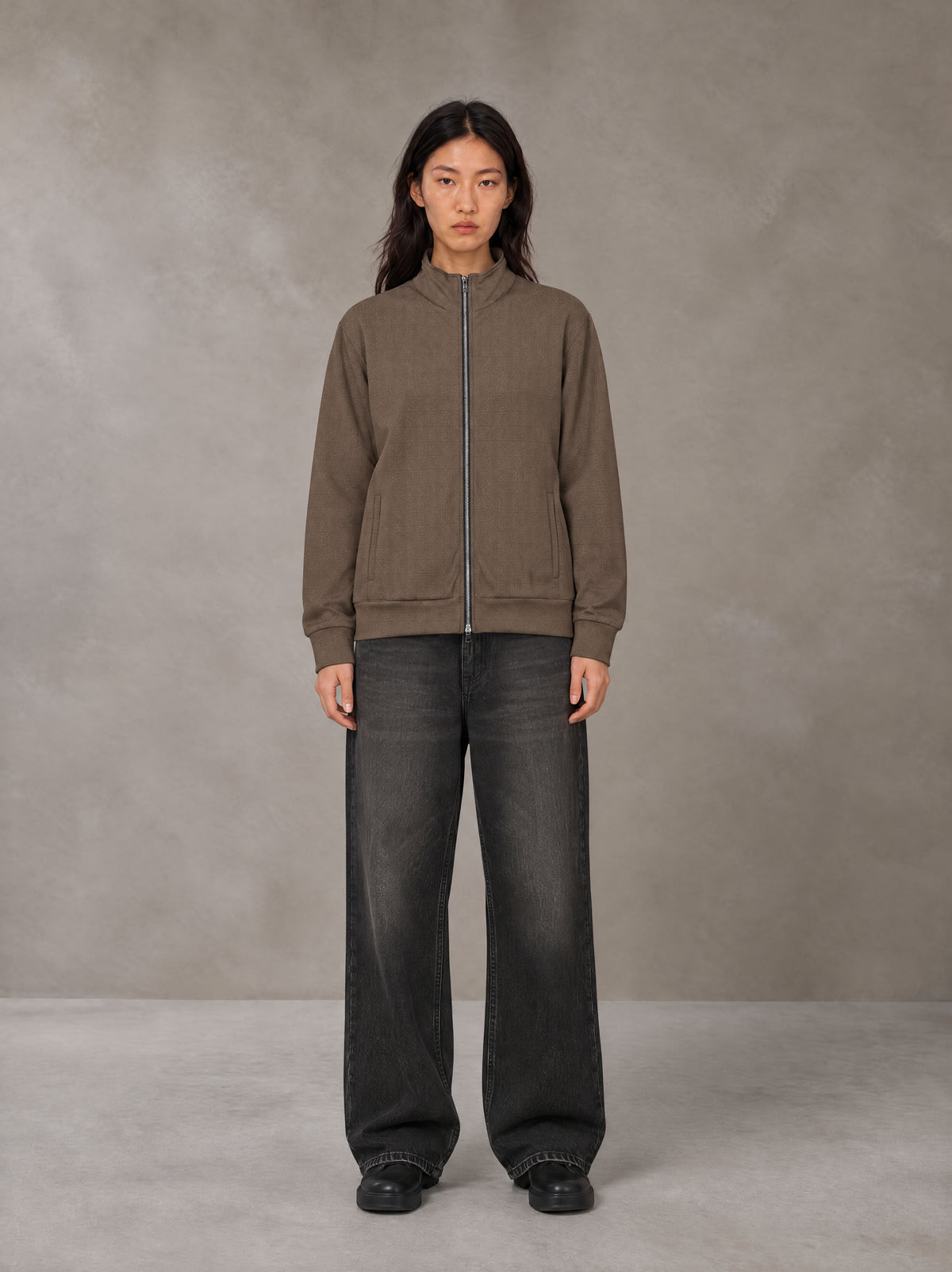 Model wearing the SM Jacquard Track Jacket in Kabul Brown, front view.
