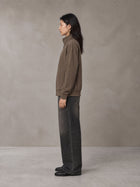 Model wearing the SM Jacquard Track Jacket in Kabul Brown, side profile.