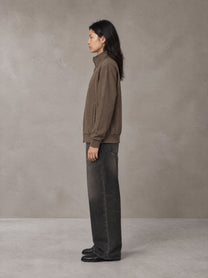 Model wearing the SM Jacquard Track Jacket in Kabul Brown, side profile.