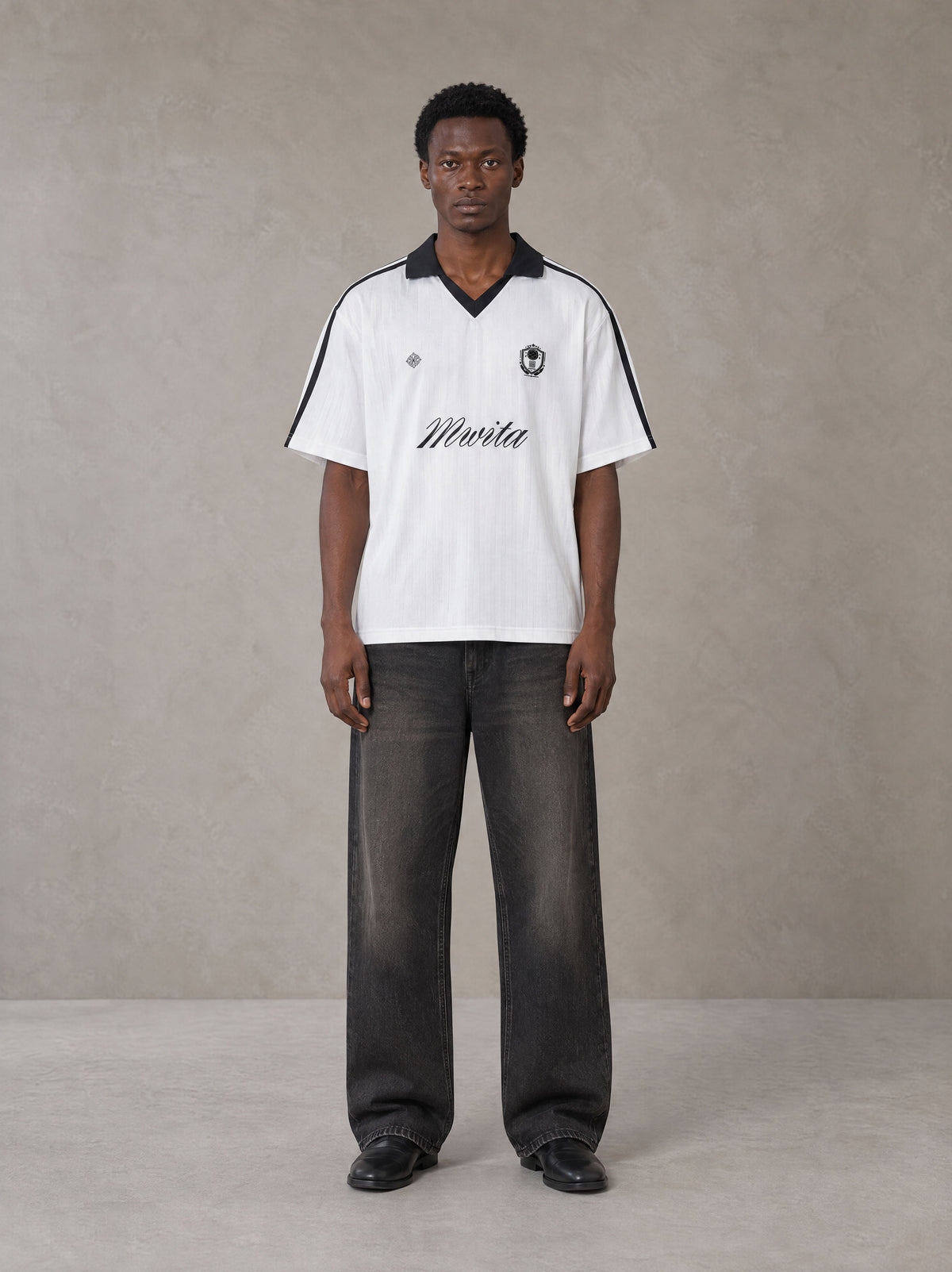 Model wearing the SM Legacy Jersey Polo T-shirt in Lucent White, front view.