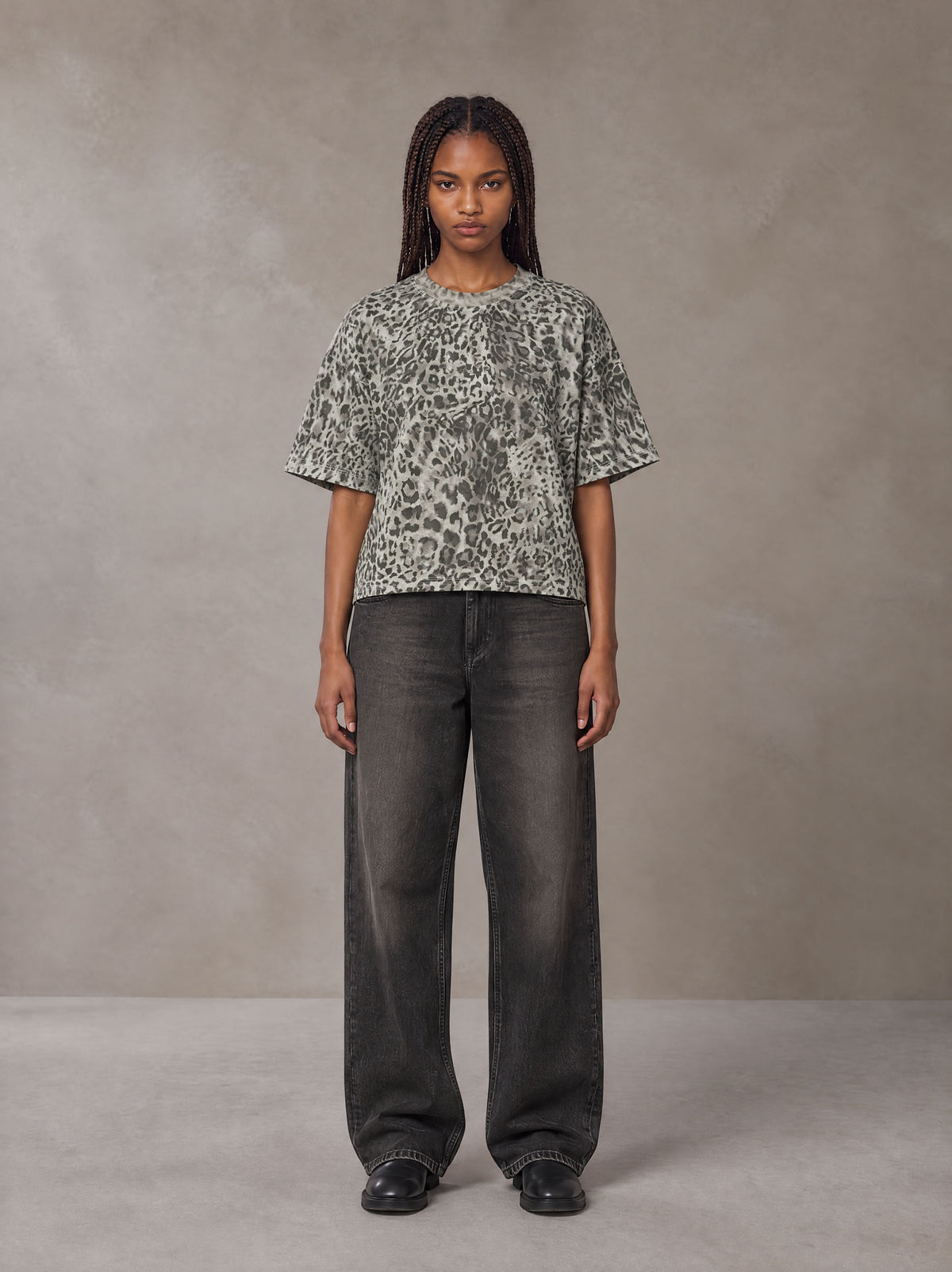 Model wearing the SM Leopard Print Boxy T-shirt in Cement, front view.