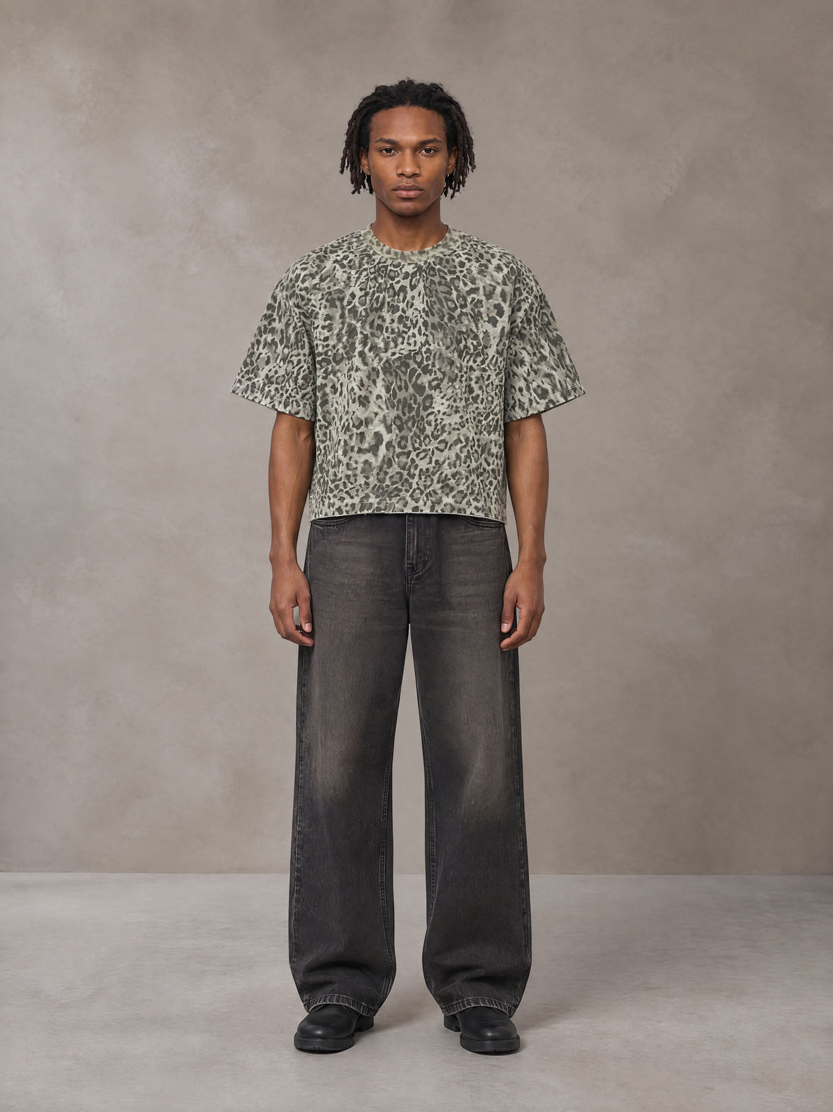 Model wearing the SM Leopard Print Boxy T-shirt in Cement, front view.