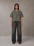 Model wearing the SM Leopard Print Boxy T-shirt in Granite Green, front view.