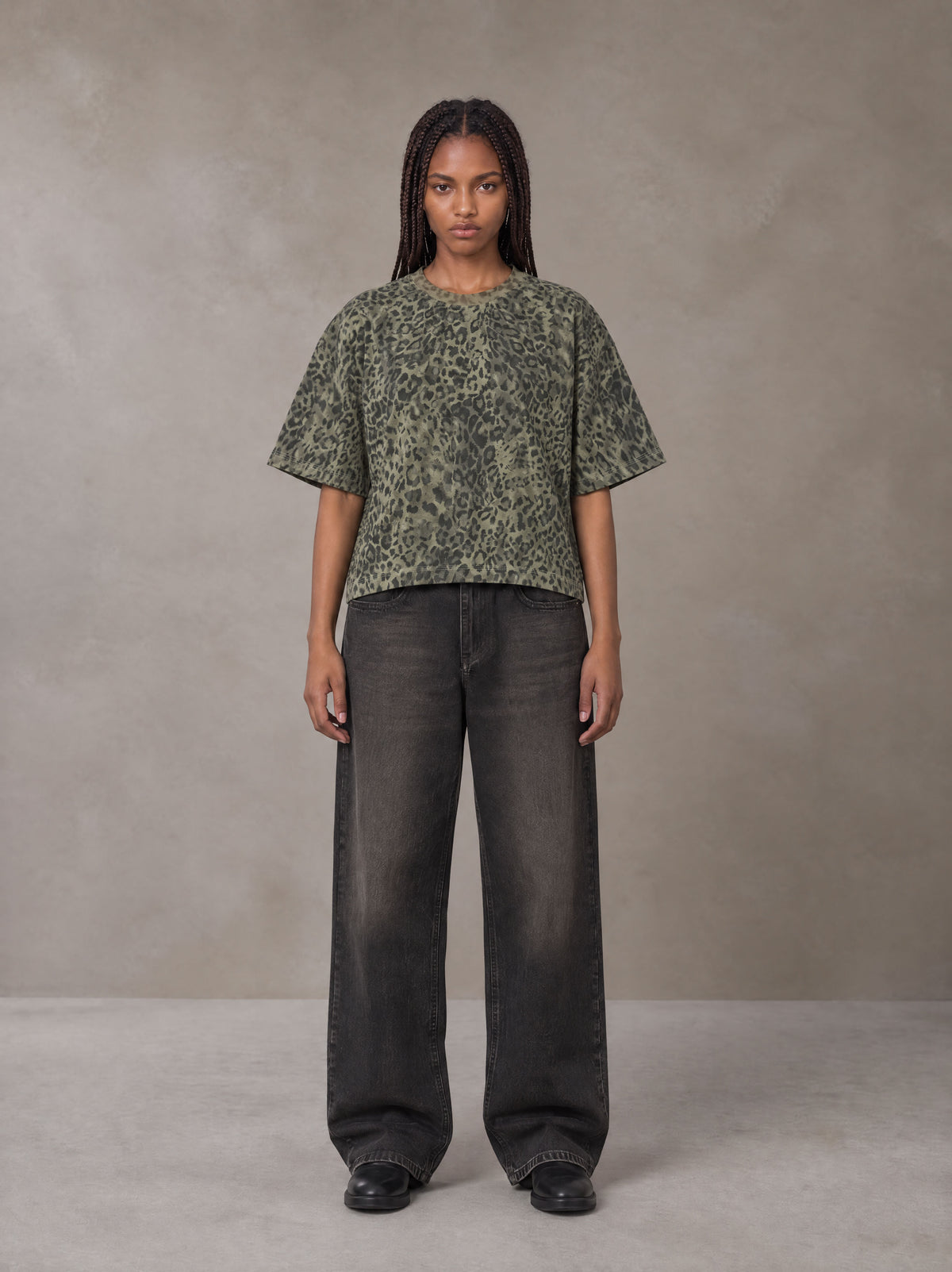 Model wearing the SM Leopard Print Boxy T-shirt in Granite Green, front view.