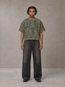 Model wearing the SM Leopard Print Boxy T-shirt in Granite Green, front view.