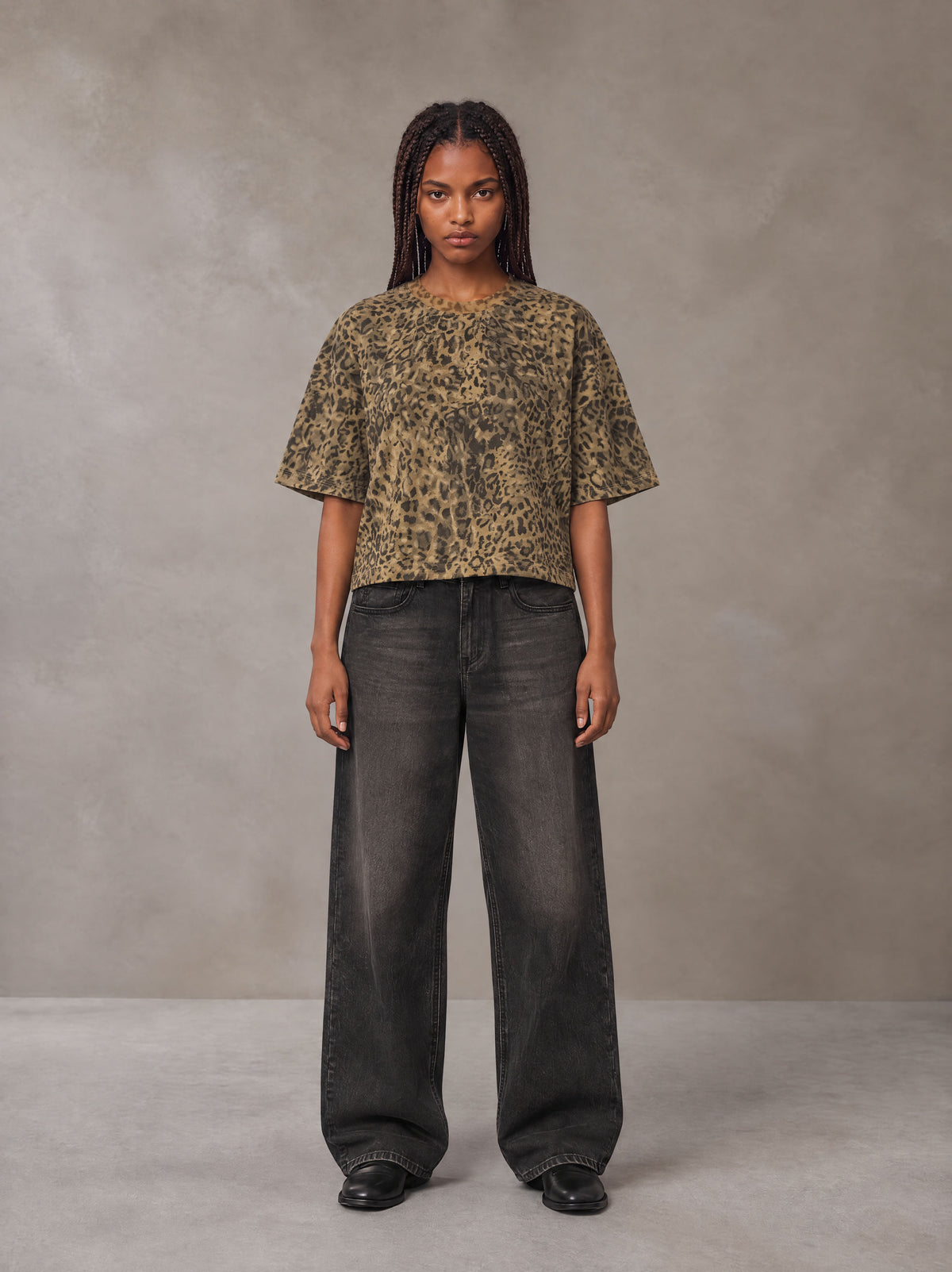 Model wearing the SM Leopard Print Boxy T-shirt in Muesli, front view.