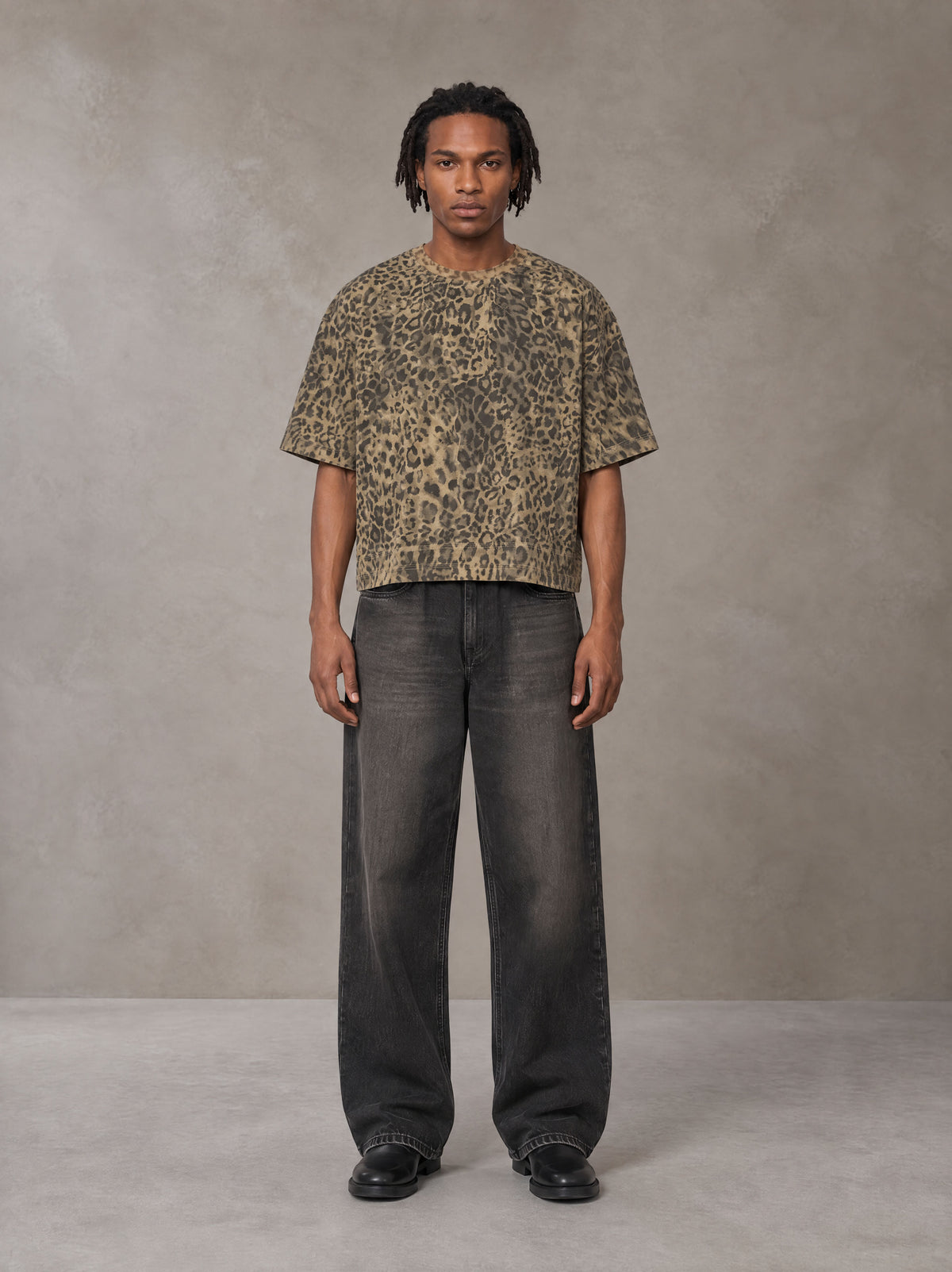 Model wearing the SM Leopard Print Boxy T-shirt in Muesli, front view.