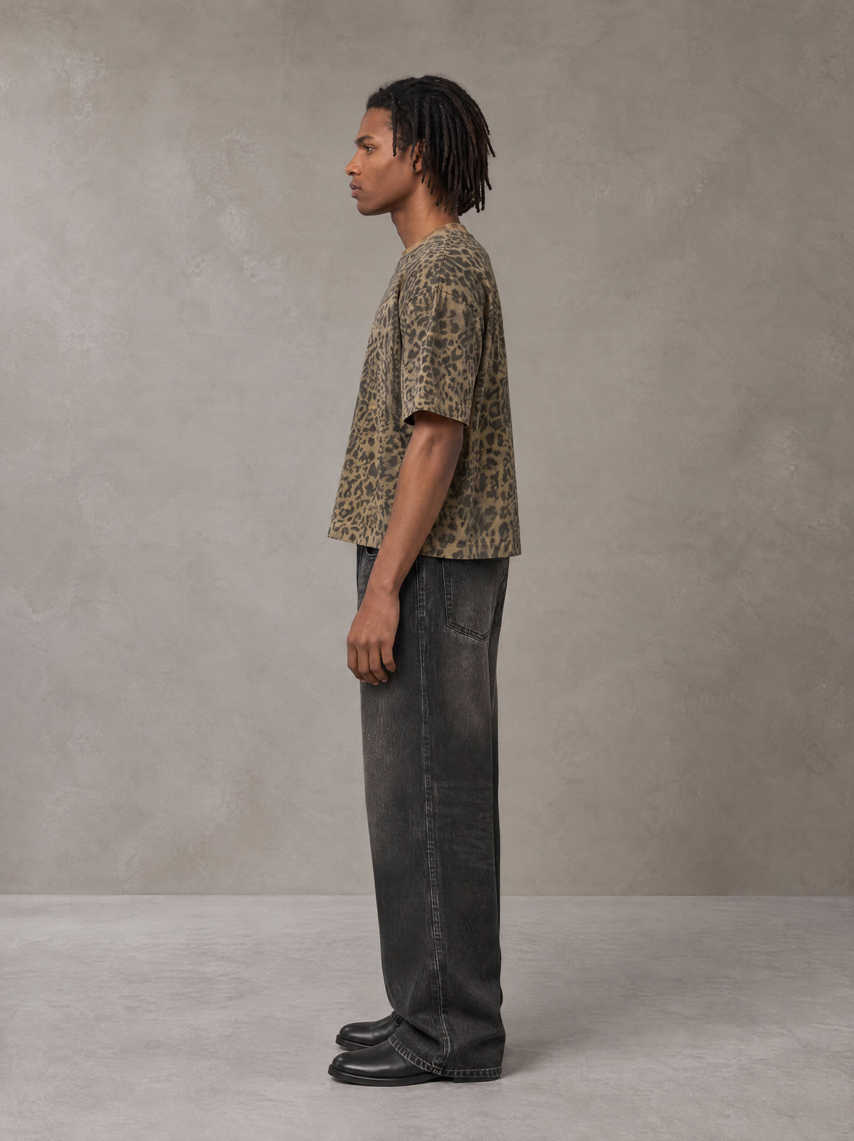 Model wearing the SM Leopard Print Boxy T-shirt in Muesli, side profile.