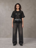 Model wearing the SM Mesh Boxy T-shirt in Midnight Black, front view.