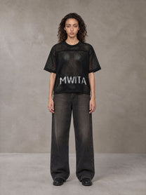 Model wearing the SM Mesh Boxy T-shirt in Midnight Black, front view.
