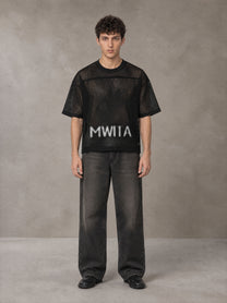 Model wearing the SM Mesh Boxy T-shirt in Midnight Black, front view.