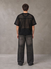 Model wearing the SM Mesh Boxy T-shirt in Midnight Black, rear view.