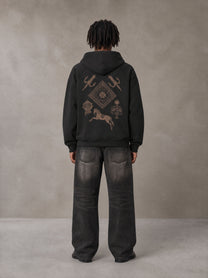 Model wearing the SM Regal Hoodie in Midnight Black, rear view.