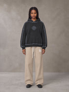 Model wearing the SM Fleece Straight Leg Trousers in Camel Tan, front view.
