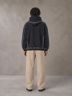 Model wearing the SM Fleece Straight Leg Trousers in Camel Tan, rear view.