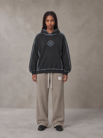 Model wearing the SM Fleece Straight Leg Trousers in Coffee Grey, front view.