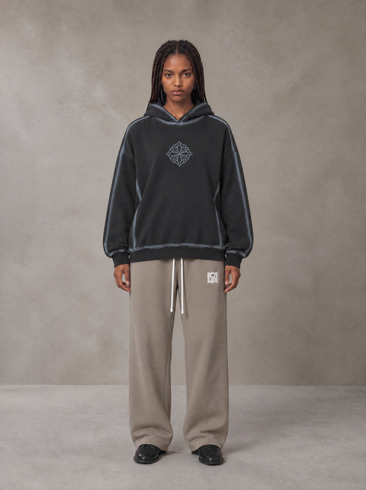 Model wearing the SM Fleece Straight Leg Trousers in Coffee Grey, front view.