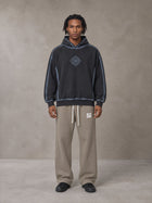 Model wearing the SM Fleece Straight Leg Trousers in Coffee Grey, front view.
