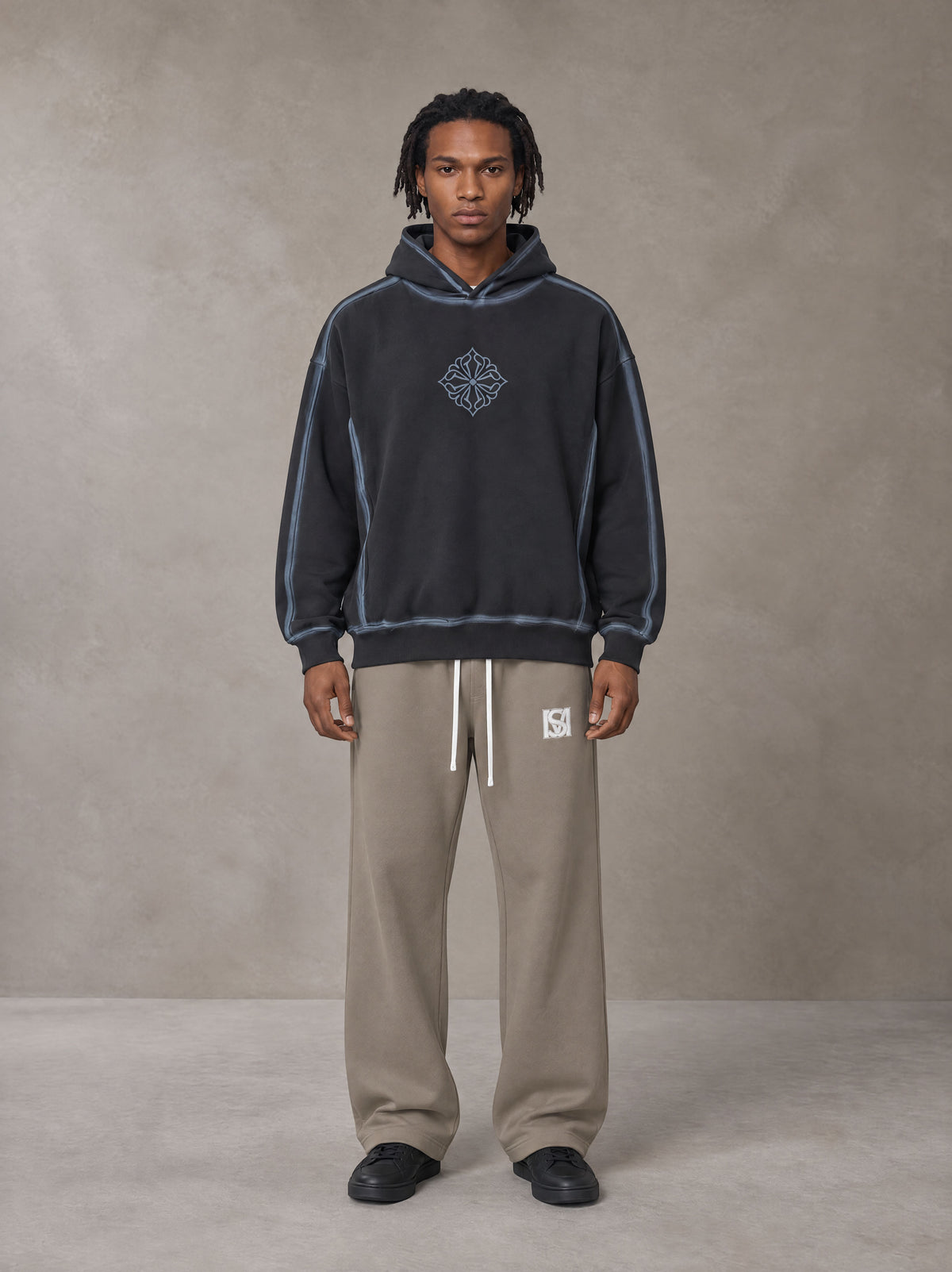Model wearing the SM Fleece Straight Leg Trousers in Coffee Grey, front view.