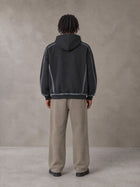 Model wearing the SM Fleece Straight Leg Trousers in Coffee Grey, rear view.