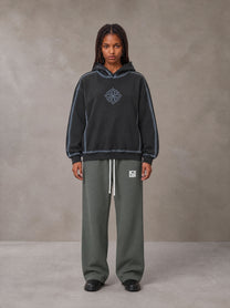 Model wearing the SM Fleece Straight Leg Trousers in Deep Charcoal, front view.