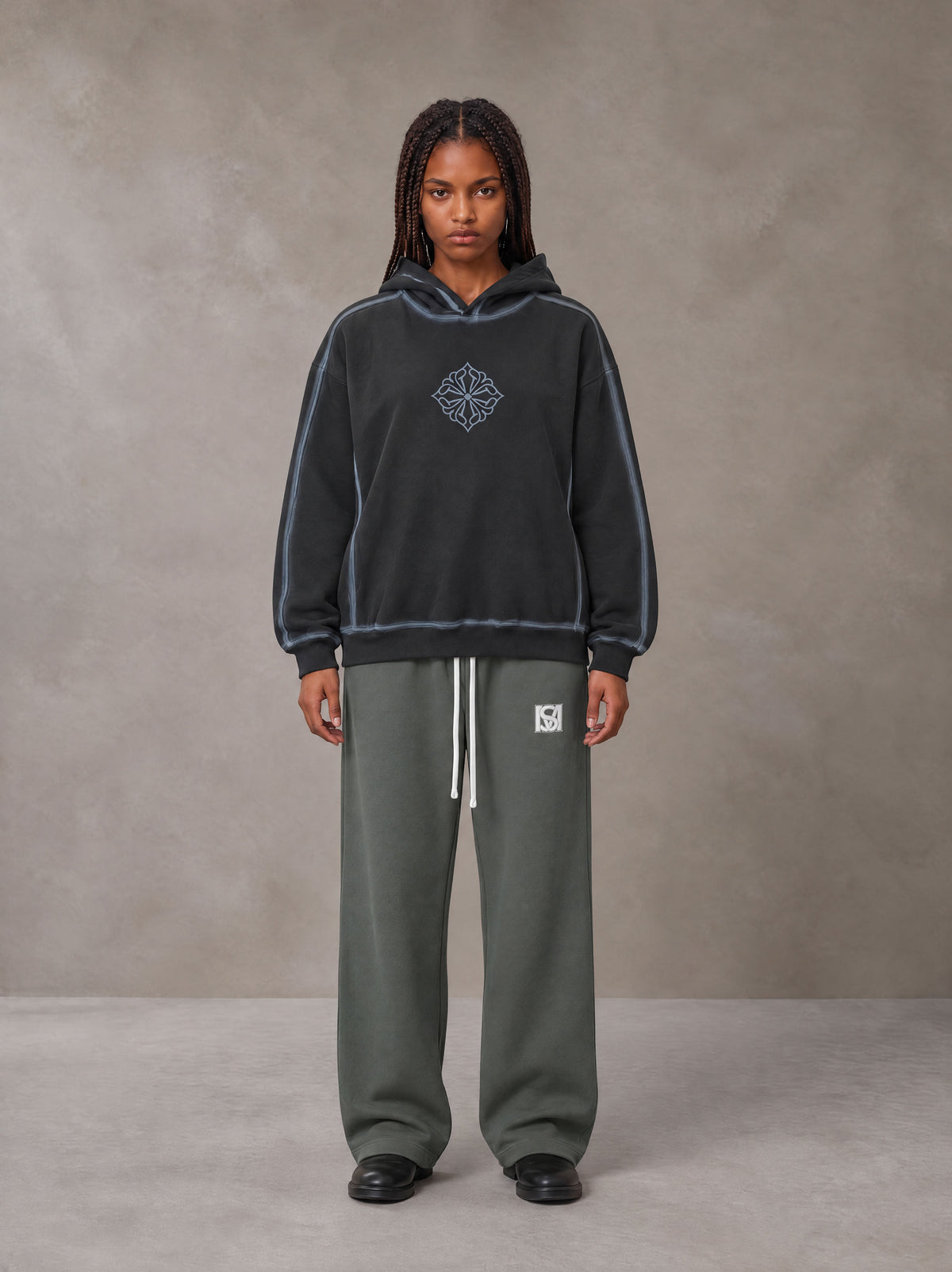 Model wearing the SM Fleece Straight Leg Trousers in Deep Charcoal, front view.