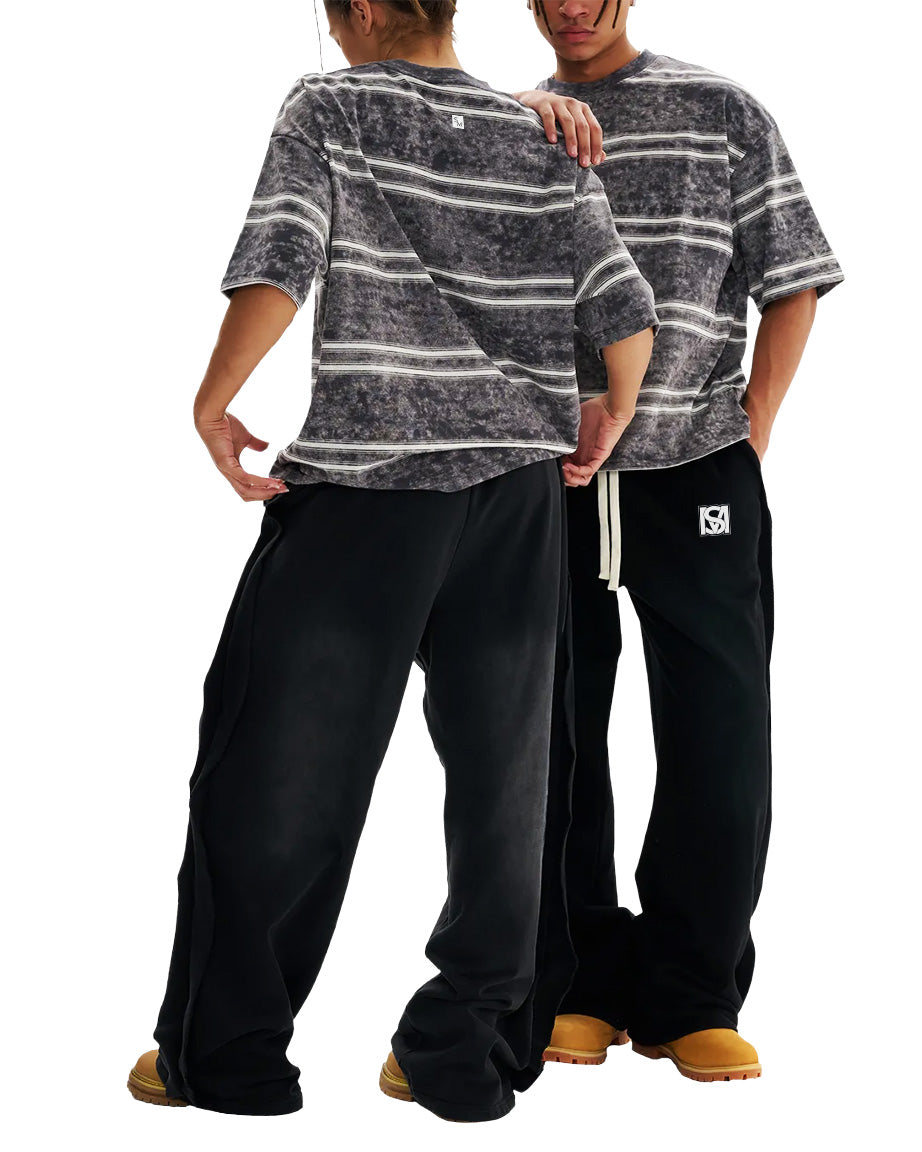 Models wearing SM Sig. Snow Washed Stripe T-shirt and SM Fleece Straight Leg Trousers