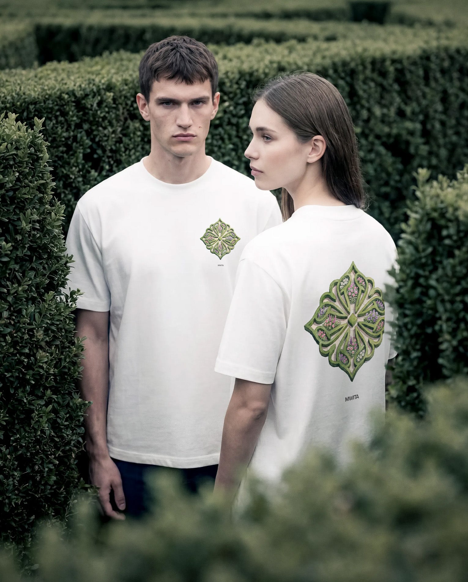 Close up of two models wearing the SM Verdant T-shirt and Heritage Straight Leg Denim Jeans